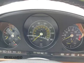 1988 Mercedes-Benz 560 with VIN WDBBA48D4JA090929, listed as a IAAI auction lot 42127701 with 186,443 mi miles. Bid and sale history available at carsss.com. Image 7.