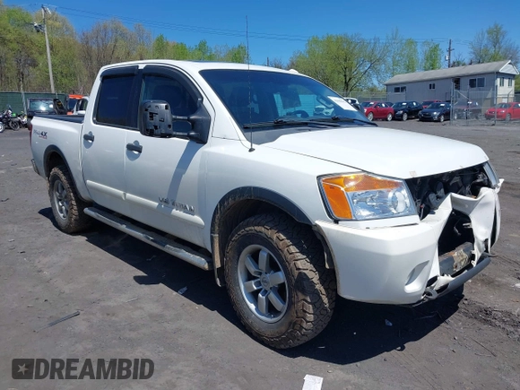 2012 Nissan Titan SV with VIN 1N6AA0EC0CN307743, listed as a IAAI auction lot 42085082 with 187,506 mi miles. Bid and sale history available at carsss.com. Image 1.