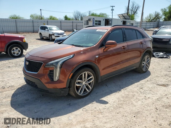 2019 Cadillac XT4 AWD Sport with VIN 1GYFZFR42KF136567, listed as a Copart auction lot 52018445 with 99,944 mi miles and Salvage title. Bid and sale history available at DreamBid. Image 1.