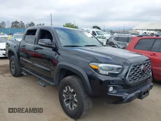 2023 Toyota Tacoma SR z VIN 3TMCZ5AN4PM548729, wystawiony jako IAAI lot #42078723 z przebiegiem 30 966 mil mil oraz . Historia ofert i sprzedaży dostępna na DreamBid. Obrazek 1.