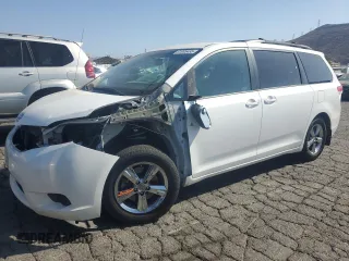 2011 Toyota Sienna LE AAS with VIN 5TDKK3DCXBS010074, listed as a Copart auction lot 61985485 with 74,554 mi miles and Salvage title. Bid and sale history available at DreamBid. Image 1.