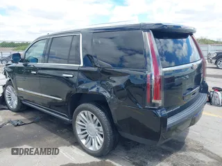 2015 Cadillac Escalade Platinum z VIN 1GYS4PKJ8FR568958, wystawiony jako IAAI lot #42316098 z przebiegiem 152 661 mil mil oraz . Historia ofert i sprzedaży dostępna na DreamBid. Obrazek 3.