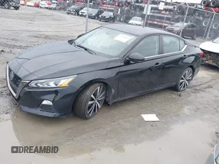 2022 Nissan Altima 2.0 SR with VIN 1N4AL4CV4NN330346, listed as a IAAI auction lot 41310227 with 33,633 mi miles. Bid and sale history available at carsss.com. Image 2.