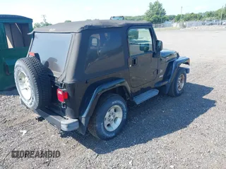 2003 Jeep Wrangler Sahara with VIN 1J4FA59S23P328003, listed as a IAAI auction lot 42833276 with 271,741 mi miles and . Bid and sale history available at DreamBid. Image 4.