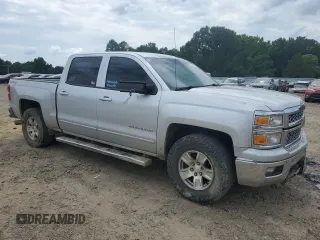 2015 Chevrolet Silverado 1500 LT with VIN 3GCUKREH9FG313504, listed as a Copart auction lot 59448974 with 172,221 mi miles and Salvage Title. Bid and sale history available at DreamBid. Image 4.