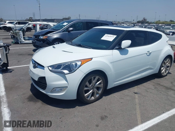 2012 Hyundai Veloster w/Black Int z VIN KMHTC6AD5CU056209, wystawiony jako IAAI lot #42565571 z przebiegiem 137 908 mil mil oraz . Historia ofert i sprzedaży dostępna na DreamBid. Obrazek 2.