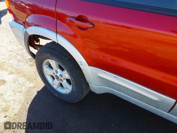 2005 Ford Escape Hybrid with VIN 1FMYU96H05KE01130, listed as a IAAI auction lot 41711338 with 288,964 mi miles. Bid and sale history available at carsss.com. Image 6.