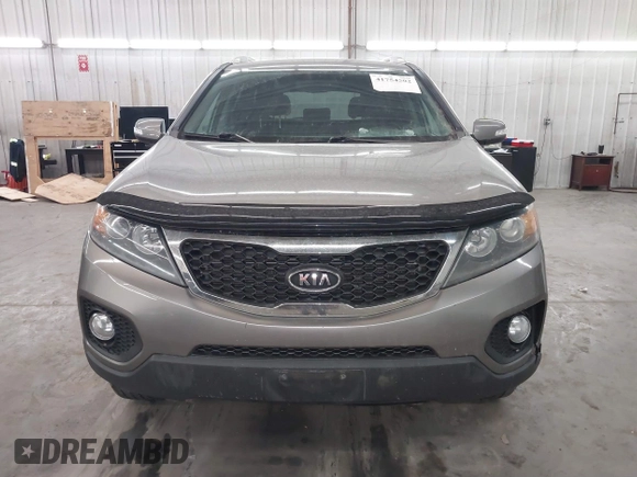 2011 Kia Sorento LX with VIN 5XYKTDA2XBG119730, listed as a IAAI auction lot 41754502 with 176,034 mi miles. Bid and sale history available at carsss.com. Image 12.