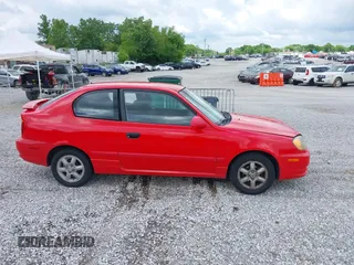 2003 Hyundai Accent GL z VIN KMHCG35CX3U247788, wystawiony jako IAAI lot #42254692 z przebiegiem 89 560 mil mil oraz . Historia ofert i sprzedaży dostępna na DreamBid. Obrazek 13.