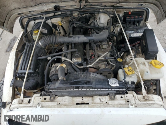 2006 Jeep Wrangler Sport Right Hand Drive with VIN 1J4F449S66P733349, listed as a Copart auction lot 80022794 with 194,692 mi miles and Salvage Title. Bid and sale history available at carsss.com. Image 12.