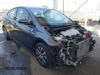 2020 Toyota Prius LE z VIN JTDKARFP8L3143375, wystawiony jako IAAI lot #42213512 z przebiegiem 52 127 mil mil oraz . Historia ofert i sprzedaży dostępna na DreamBid. Obrazek 1.