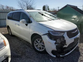 2021 Chrysler Pacifica Touring L with VIN 2C4RC1BGXMR532883, listed as a Copart auction lot 50173485 with 154,431 mi miles and Salvage Title. Bid and sale history available at DreamBid. Image 4.