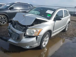 2011 Dodge Caliber Mainstreet with VIN 1B3CB3HA7BD168429, listed as a IAAI auction lot 41035025 with 155,614 mi miles and . Bid and sale history available at DreamBid. Image 2.