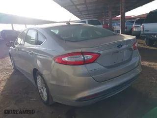 2015 Ford Fusion SE Hybrid with VIN 3FA6P0LU2FR156205, listed as a IAAI auction lot 41533507 with 98,693 mi miles. Bid and sale history available at carsss.com. Image 3.