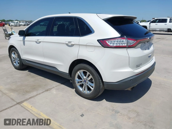 2015 Ford Edge SEL with VIN 2FMTK3J97FBC16209, listed as a IAAI auction lot 41974393 with 129,608 mi miles. Bid and sale history available at carsss.com. Image 3.