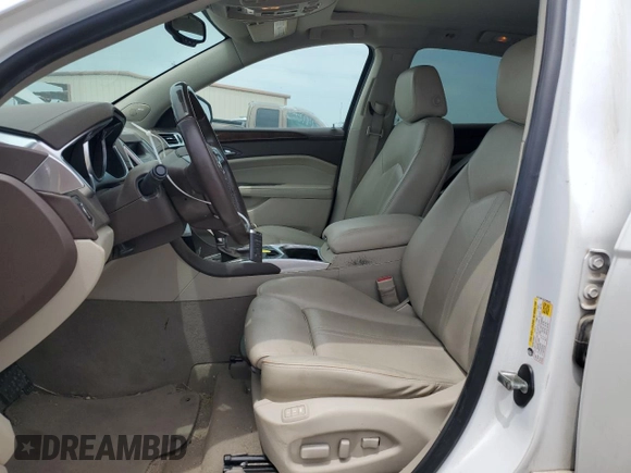 2012 Cadillac SRX Performance Collection z VIN 3GYFNBE32CS588355, wystawiony jako Copart lot #56704075 z przebiegiem 195 162 mil mil oraz Szkoda całkowita • Salvage title. Historia ofert i sprzedaży dostępna na DreamBid. Obrazek 7.