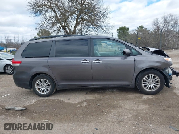 2014 Toyota Sienna XLE with VIN 5TDYK3DC0ES422700, listed as a IAAI auction lot 42049181 with 147,498 mi miles. Bid and sale history available at carsss.com. Image 13.