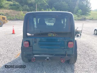 1998 Jeep Wrangler Sport with VIN 1J4FY19S2WP786844, listed as a IAAI auction lot 42382789 with 306,228 mi miles and . Bid and sale history available at DreamBid. Image 17.