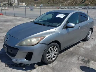 2012 Mazda 3 i Sport with VIN JM1BL1UF4C1595650, listed as a IAAI auction lot 40127921 with 190,421 mi miles and . Bid and sale history available at DreamBid. Image 2.