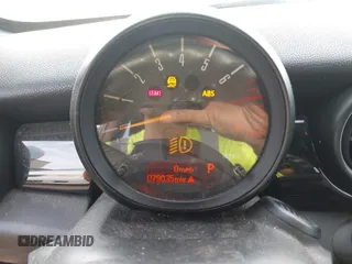 2015 MINI Coupe z VIN WMWSX1C54FT508123, wystawiony jako IAAI lot #40974103 z przebiegiem 79 035 mil mil oraz . Historia ofert i sprzedaży dostępna na DreamBid. Obrazek 7.