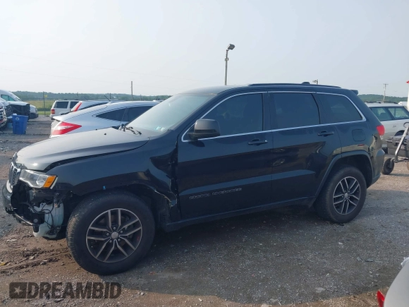 2017 Jeep Grand Cherokee Laredo with VIN 1C4RJFAG0HC706155, listed as a IAAI auction lot 42452967 with 144,925 mi miles and . Bid and sale history available at DreamBid. Image 14.