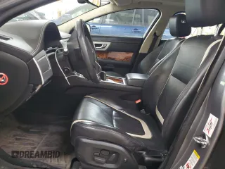 2015 Jaguar XF Portfolio with VIN SAJWJ0FF8F8U65883, listed as a Copart auction lot 55783945 with 133,431 mi miles and Salvage Title. Bid and sale history available at DreamBid. Image 7.