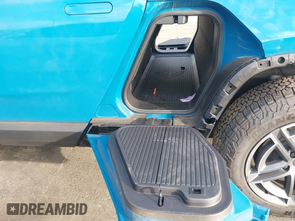 2025 Rivian R1T Adventure z VIN 7FCTGBAA9SN035986, wystawiony jako IAAI lot #41510257 z przebiegiem 2 102 mil mil oraz . Historia ofert i sprzedaży dostępna na DreamBid. Obrazek 20.