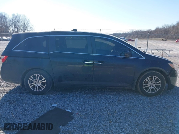 2012 Honda Odyssey EX-L with VIN 5FNRL5H69CB017227, listed as a IAAI auction lot 41345254 with 136,775 mi miles and . Bid and sale history available at carsss.com. Image 13.