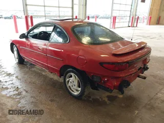 2000 Ford Escort ZX2 with VIN 3FAKP1133YR124283, listed as a IAAI auction lot 41210679 with 217,629 mi miles. Bid and sale history available at carsss.com. Image 3.