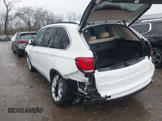 2016 BMW X5 sDrive35i with VIN 5UXKR2C56G0R69814, listed as a IAAI auction lot 41088279 with 81,219 mi miles. Bid and sale history available at carsss.com. Image 3.