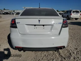 2009 Pontiac G8 GT with VIN 6G2EC57Y59L233364, listed as a Copart auction lot 72764514 with 92,535 mi miles and Salvage Title. Bid and sale history available at carsss.com. Image 6.