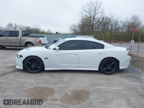 2019 Dodge Charger Scat Pack with VIN 2C3CDXGJXKH635612, listed as a IAAI auction lot 42010995 with 34,860 mi miles and . Bid and sale history available at DreamBid. Image 14.