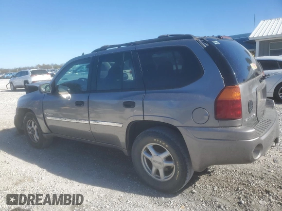 2006 GMC Envoy SLE with VIN 1GKDS13S662184697, listed as a Copart auction lot 80043434 with 196,077 mi miles and Salvage Title. Bid and sale history available at carsss.com. Image 2.