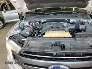 2018 Ford F-150 XL с VIN 1FTEW1EP8JKE59072, выставлен на аукционе Copart как лот 70933085 с пробегом 94 502 миль миль и Списание • Salvage title. История ставок и продаж доступна на DreamBid. Изображение 13.