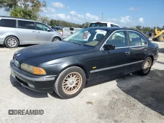 2000 BMW 5 Series 528iA with VIN WBADM6340YGU16735, listed as a Copart auction lot 77249644 with 0 mi miles and Salvage Title. Bid and sale history available at carsss.com. Image 1.