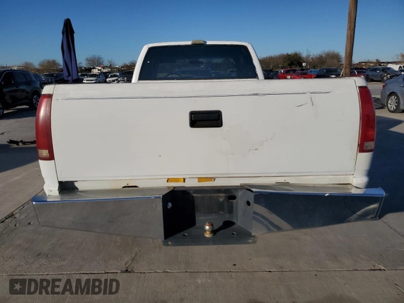 1991 GMC Sierra 1500 with VIN 2GTGC29K3M1532424, listed as a Copart auction lot 86216144 with 173,257 mi miles and Salvage Title. Bid and sale history available at DreamBid. Image 6.