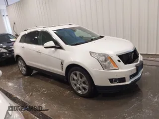 2012 Cadillac SRX Premium Collection with VIN 3GYFNFE38CS591123, listed as a IAAI auction lot 41827636 with 143,867 mi miles. Bid and sale history available at carsss.com. Image 1.