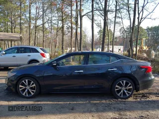 2017 Nissan Maxima SV z VIN 1N4AA6AP9HC399703, wystawiony jako IAAI lot #41858782 z przebiegiem 89 131 mil mil oraz . Historia ofert i sprzedaży dostępna na DreamBid. Obrazek 14.