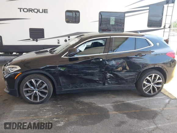 2018 BMW X2 sDrive28i with VIN WBXYJ3C32JEJ84291, listed as a IAAI auction lot 42575234 with 65,081 mi miles and . Bid and sale history available at DreamBid. Image 14.