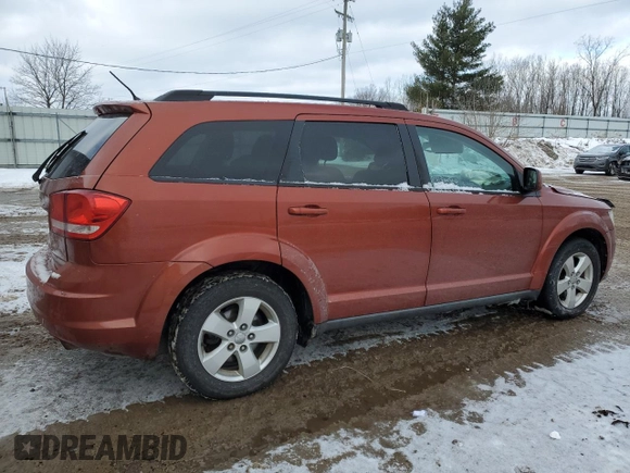 2013 Dodge Journey SE Plus with VIN 3C4PDCABXDT613045, listed as a Copart auction lot 88602235 with 255,617 mi miles and Salvage title. Bid and sale history available at DreamBid. Image 3.
