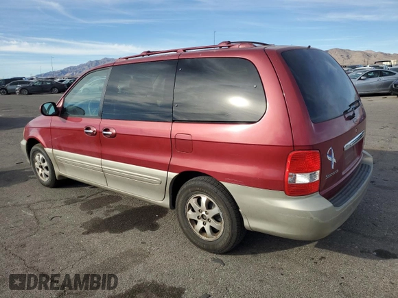 2004 Kia Sedona LX with VIN KNDUP131546612432, listed as a Copart auction lot 87326764 with 156,259 mi miles and Salvage Title. Bid and sale history available at carsss.com. Image 2.