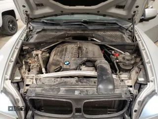 2013 BMW X5 xDrive35i z VIN 5UXZV4C5XD0B23352, wystawiony jako Copart lot #57481655 z przebiegiem 126 891 mil mil oraz Szkody całkowita. Historia ofert i sprzedaży dostępna na DreamBid. Obrazek 11.