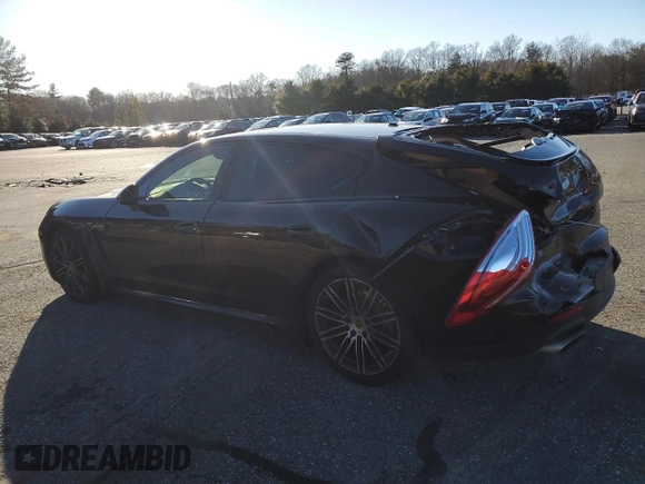 2016 Porsche Panamera 4 with VIN WP0AA2A79GL002671, listed as a Copart auction lot 87905645 with 96,048 mi miles and Salvage title. Bid and sale history available at DreamBid. Image 2.