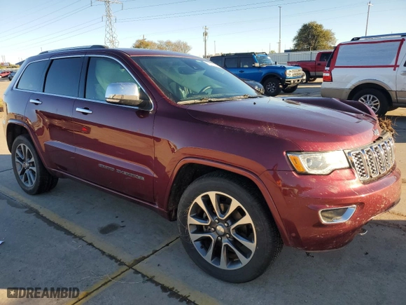 2017 Jeep Grand Cherokee Overland with VIN 1C4RJECG2HC868313, listed as a Copart auction lot 79510394 with 111,624 mi miles and Salvage Title. Bid and sale history available at carsss.com. Image 4.