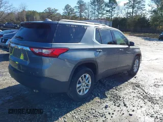 2021 Chevrolet Traverse LT Cloth with VIN 1GNERGKW9MJ210996, listed as a IAAI auction lot 41439953 with 52,099 mi miles. Bid and sale history available at carsss.com. Image 4.