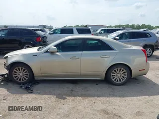 2013 Cadillac CTS Luxury with VIN 1G6DE5E55D0120843, listed as a IAAI auction lot 42145982 with 147,127 mi miles and . Bid and sale history available at DreamBid. Image 14.