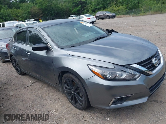 2017 Nissan Altima SV z VIN 1N4AL3AP4HC266324, wystawiony jako IAAI lot #42170025 z przebiegiem 127 595 mil mil oraz . Historia ofert i sprzedaży dostępna na DreamBid. Obrazek 1.