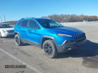 2018 Jeep Cherokee Trailhawk with VIN 1C4PJMBB2JD529977, listed as a IAAI auction lot 40888811 with 112,937 mi miles. Bid and sale history available at carsss.com. Image 1.