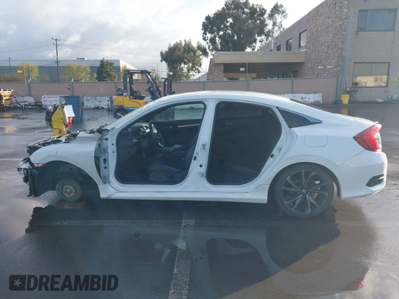 2019 Honda Civic Sport with VIN 19XFC2F86KE215368, listed as a IAAI auction lot 41934715 with 50,253 mi miles and . Bid and sale history available at DreamBid. Image 13.