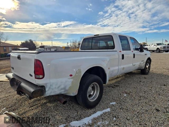 1999 Ford F-350 XL z VIN 1FTWW32F4XED65158, wystawiony jako Copart lot #41690765 z przebiegiem 147 314 mil mil oraz Czysty tytuł • Clean title. Historia ofert i sprzedaży dostępna na DreamBid. Obrazek 4.